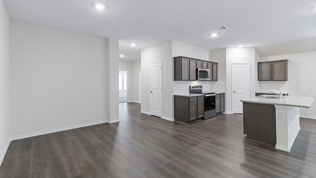 Representative furnished interior of a home built from the X40L Lakeway by D.R. Horton in Valor Farms, Royse City (Image 8).