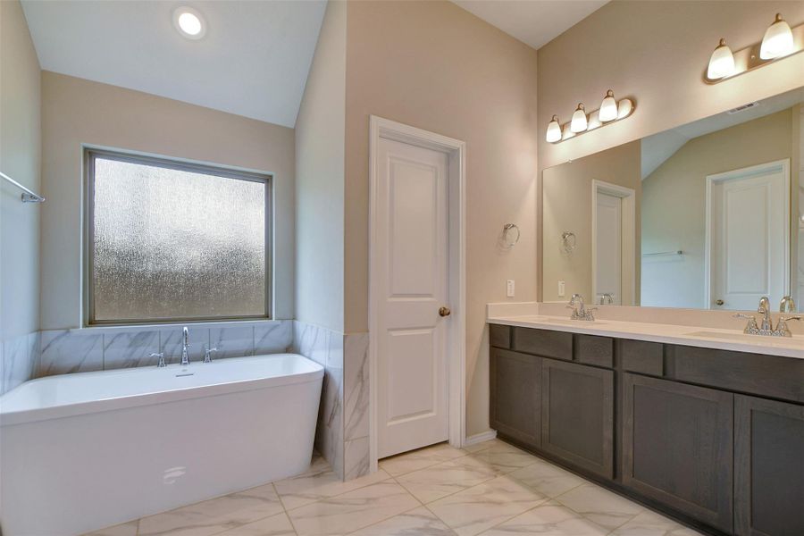 Furnished interior view inside a new home in The Highlands, Porter (Image 9).