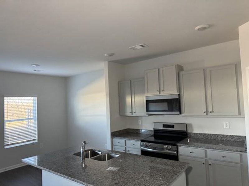 Furnished interior view inside a new home in , Calhoun (Image 3).