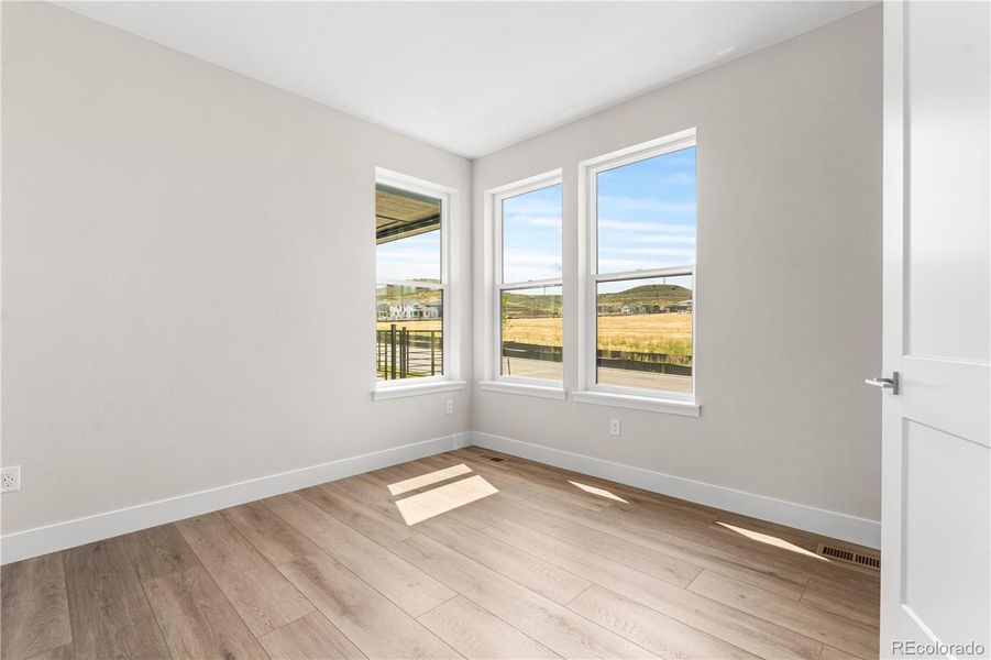 Spacious, unfurnished interior of a new home in Storytellers at Lyric, Lone Tree (Image 23).