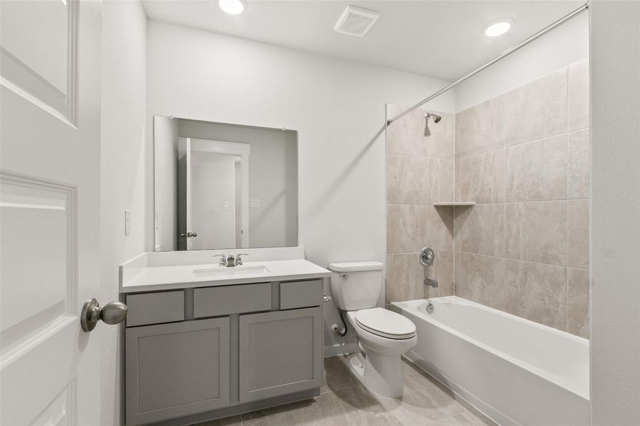 Furnished interior view inside a new home in Sunterra, Katy (Image 6).