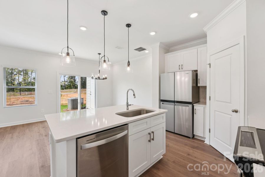 Photo is not of the actual home, but is an inspirational photo of builder’s model home and may depict options, furnishings, and/or decorator features that are not included