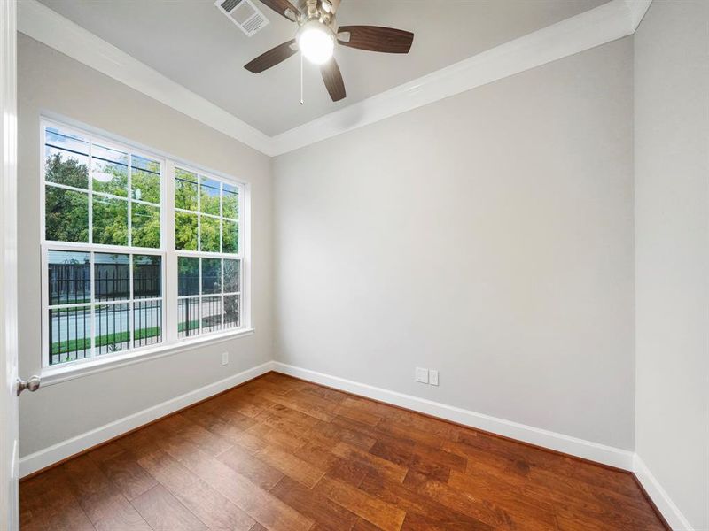 The large study, located at the front of the home, offers additional storage and a space to work from home.(Sample photo of a completed Sterling Floor Plan. Image may show alternative features/and or upgrades.)