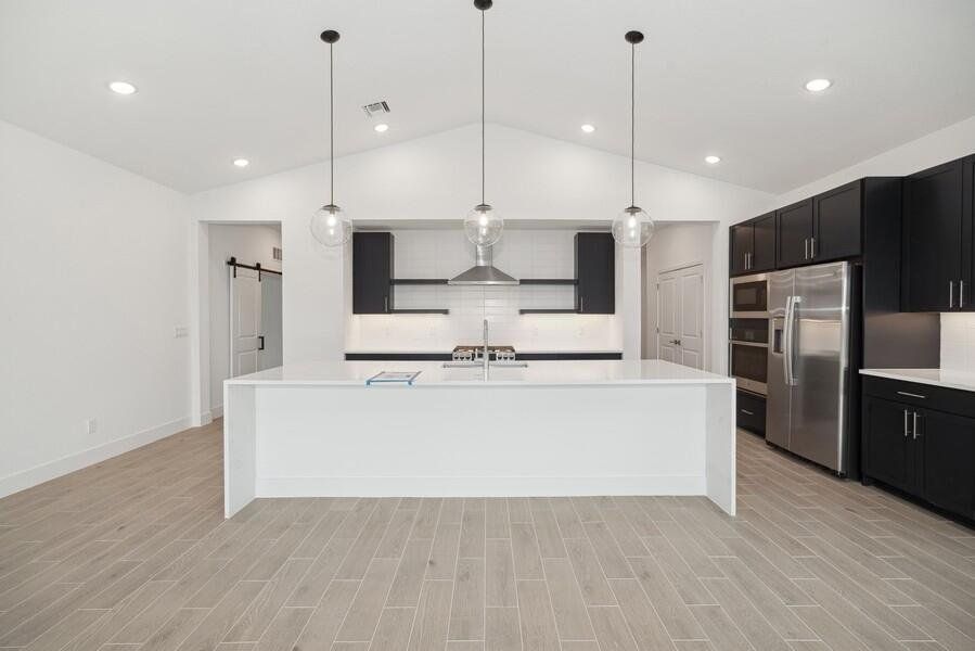 (Some or all of photography is of model or similar home and/or renderings and not necessarily indicative of available home). This home has white kitchen cabinets.
