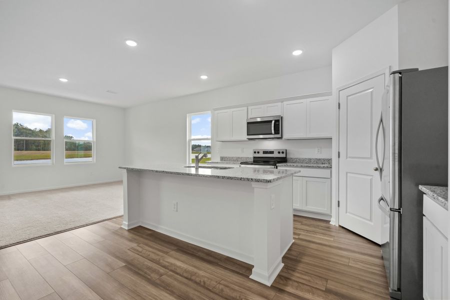 Representative furnished interior of a home built from the Moonbeam by Starlight Homes in Spring Grove, Aynor (Image 9).
