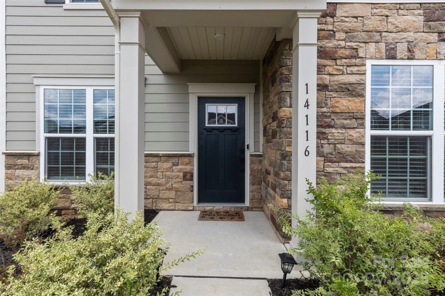 Front exterior of a new home in , Charlotte, NC, highlighting curb appeal (Image 22).