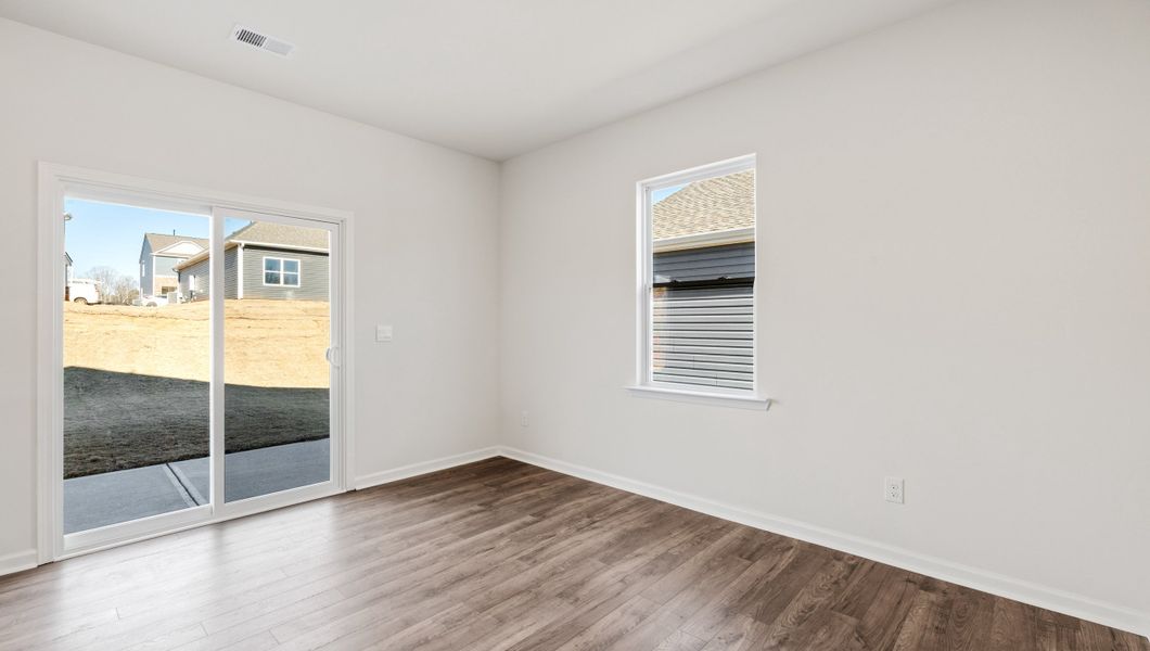 Representative unfurnished interior of a home built from the WILMINGTON by D.R. Horton in Benjamin's Grove, Woodruff (Image 18).