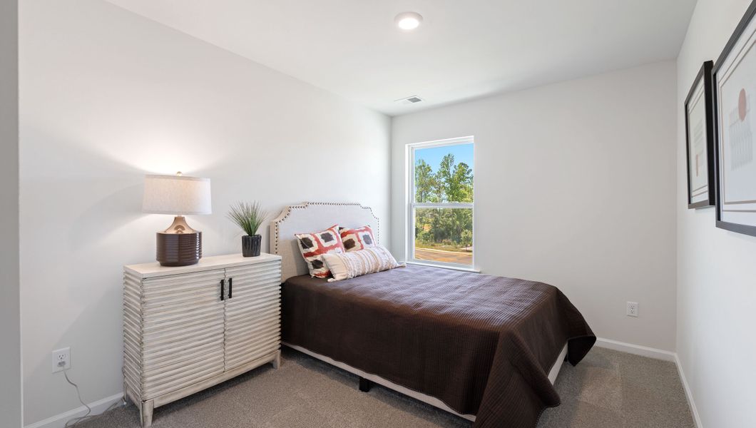 Furnished interior view inside a new home in Tanglewood Townes, Greenville (Image 18).