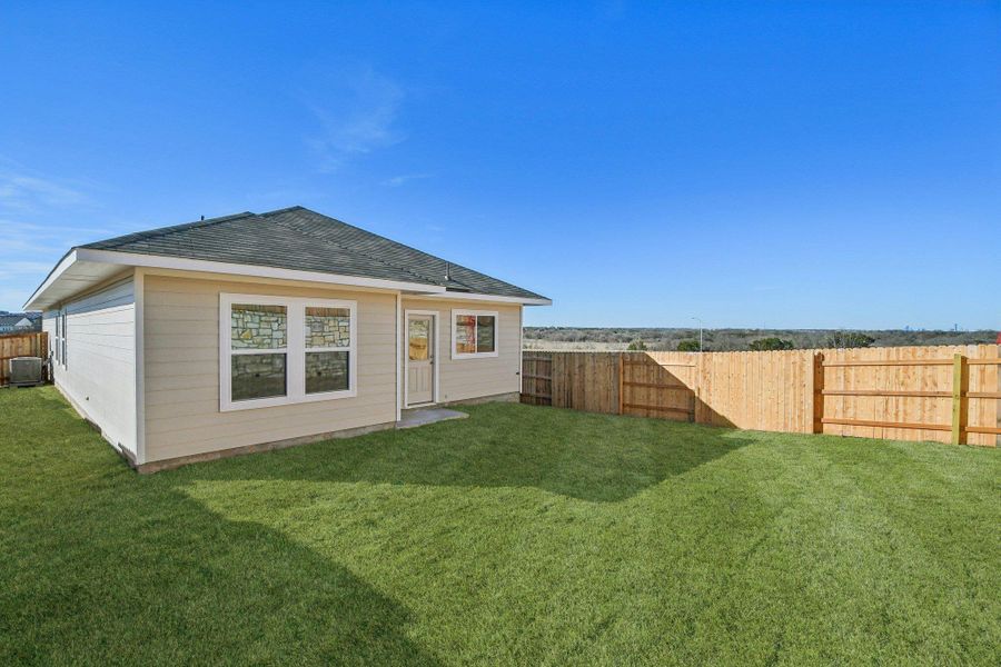 Rear of Home and Private Backyard