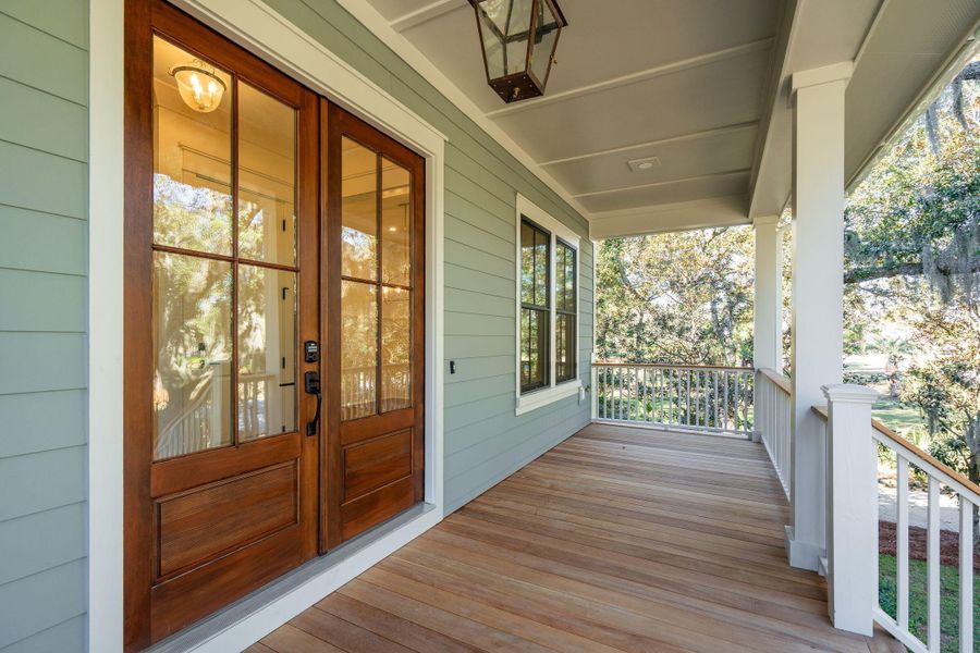 Exterior details and patio area of a home in , Johns Island (Image 39).