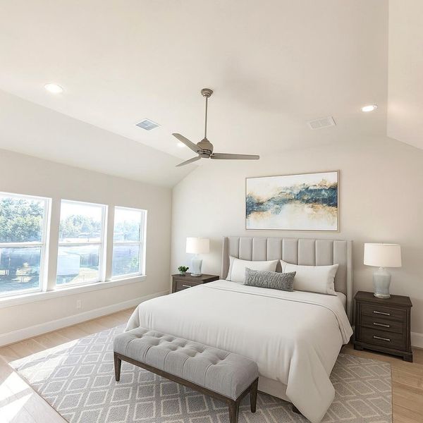 Vaulted Ceilings in the Primary Bedroom.  Wide Plank Wood Flooring.  (picture was virtually staged)