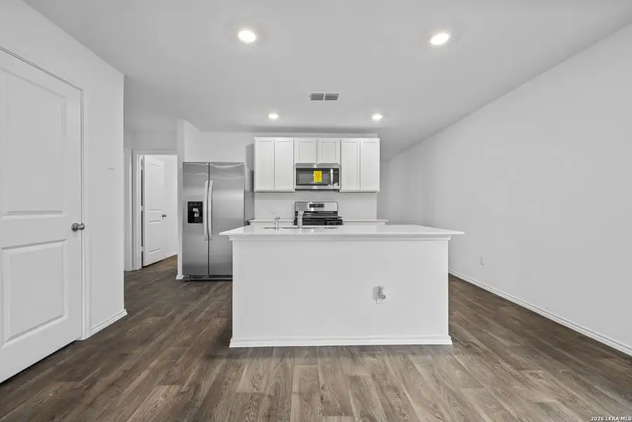 Furnished interior view inside a new home in Avenida, Converse (Image 4).