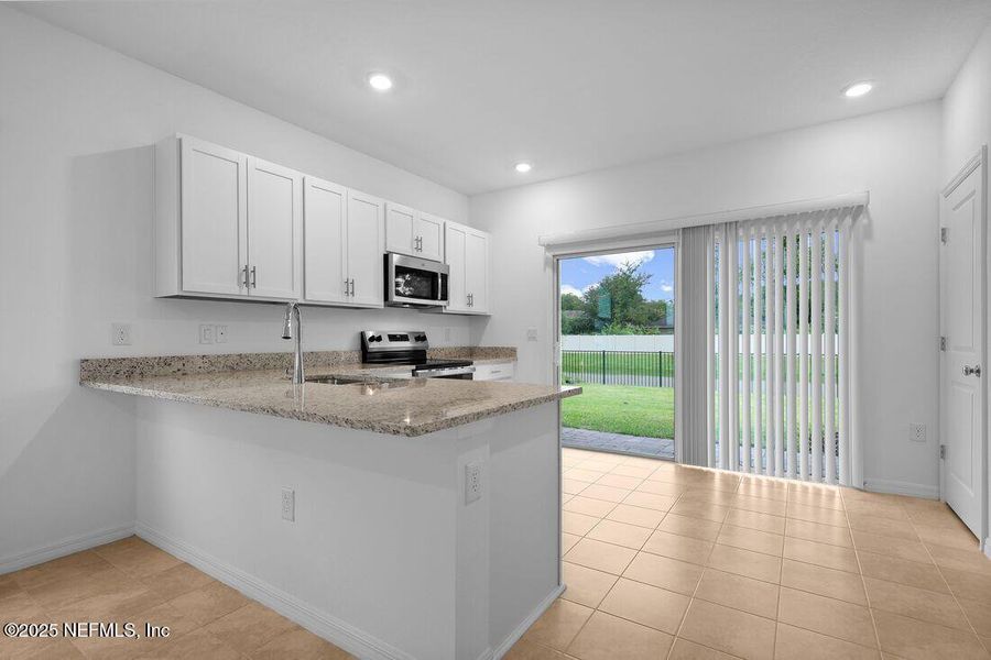 Furnished interior view inside a new home in Sabal Terrace, Jacksonville (Image 5).