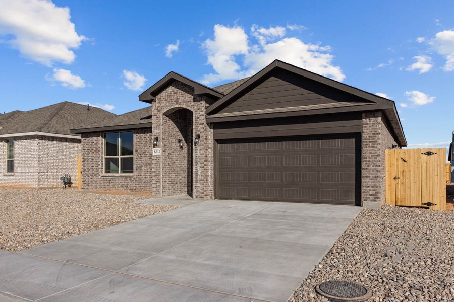 Representative exterior photo of a completed home built from the Starkville by D.R. Horton in Yukon Ridge, Odessa, TX (Image 19). Representative exterior photo of a completed home built from the Starkville by D.R. Horton in Yukon Ridge, Odessa, TX (Image 19).