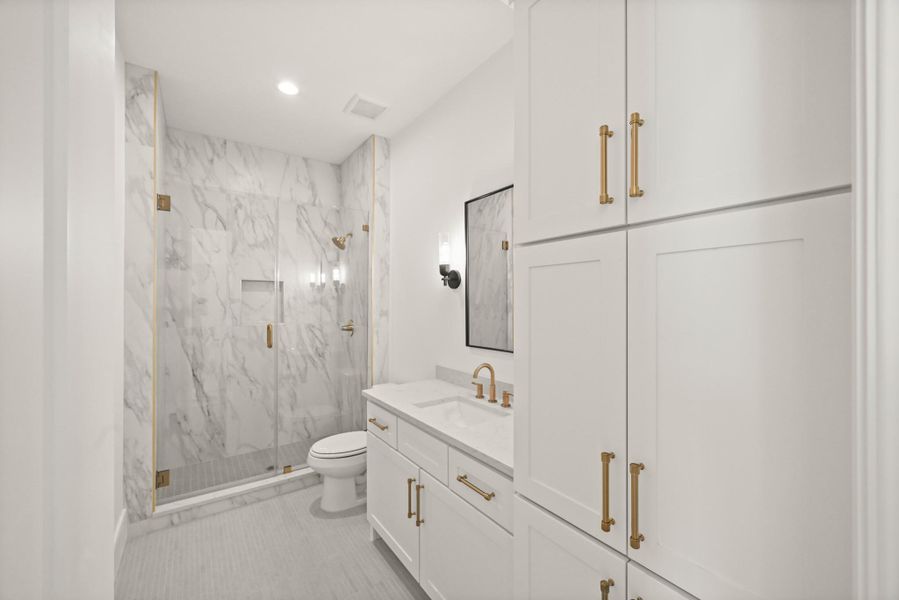 The guest suite boasts a private full bath!