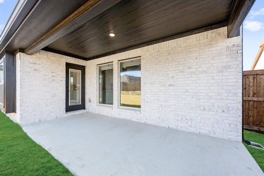 Exterior details and patio area of a home in Devonshire Classic 60-65, Forney (Image 4).
