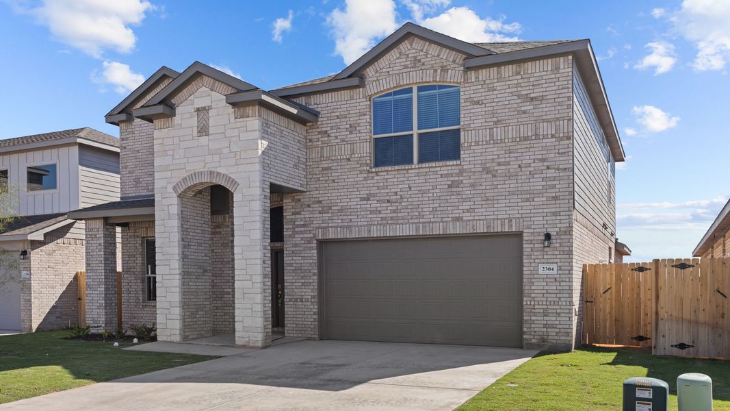 Representative exterior photo of a completed home built from the REDROCK by D.R. Horton in Northwest Passage, Midland, TX (Image 2). Representative exterior photo of a completed home built from the REDROCK by D.R. Horton in Northwest Passage, Midland, TX (Image 2).