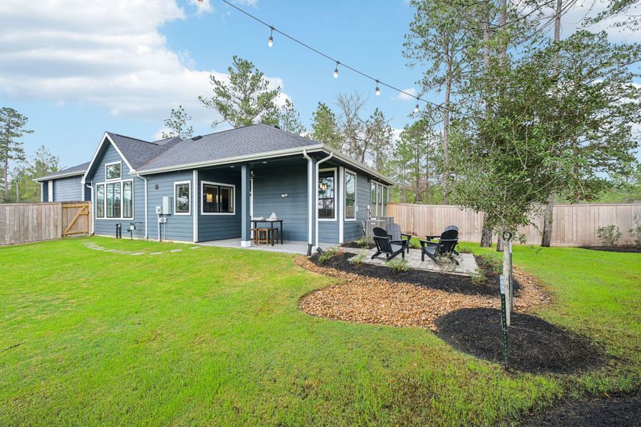 Representative exterior details of a home built from the Tanlay – Chateau by Chesmar Homes in The Woodlands Hills, Willis (Image 3).