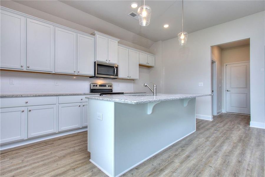 Furnished interior view inside a new home in , Homer (Image 3).
