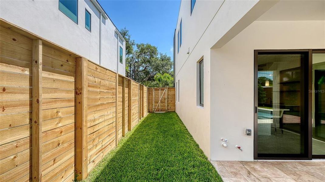 Exterior details and patio area of a home in , Sarasota (Image 37).