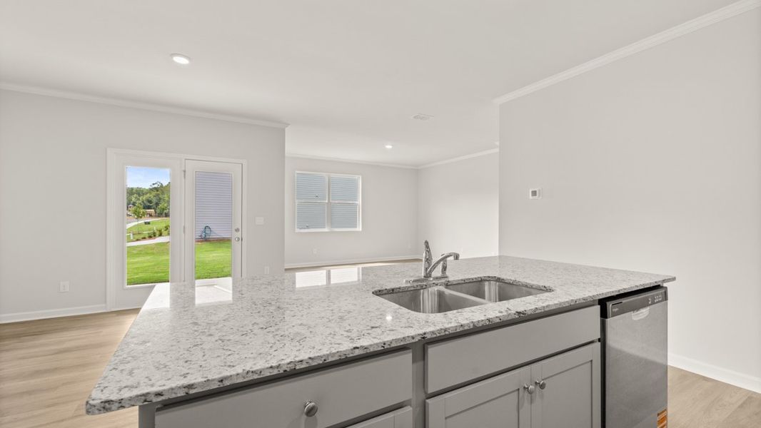 Representative furnished interior of a home built from the Cali by D.R. Horton in Sheffield Highlands, Dallas (Image 10).