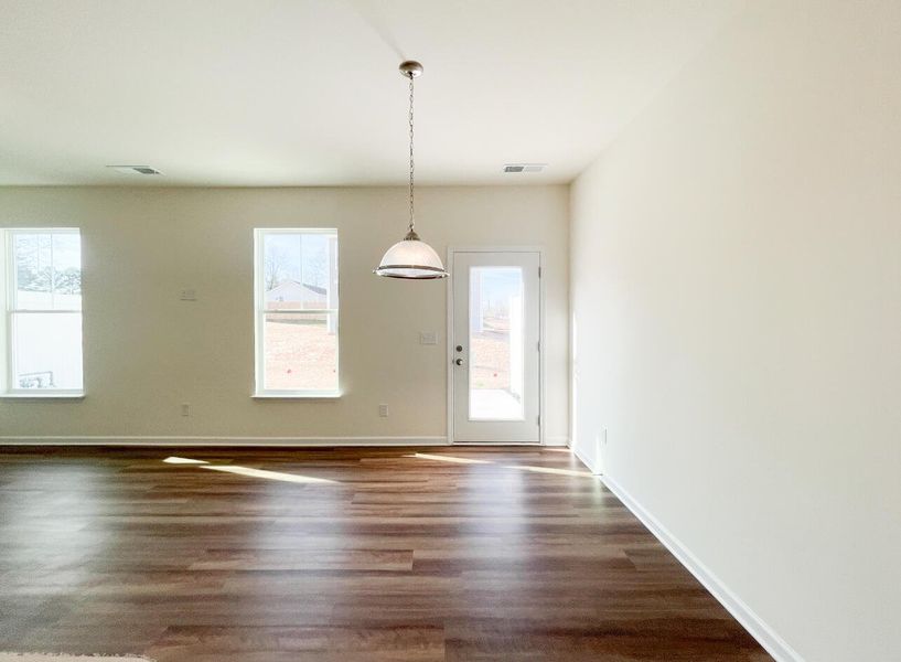 Spacious, unfurnished interior of a new home in Bellevue Townhomes, Greenville (Image 13).