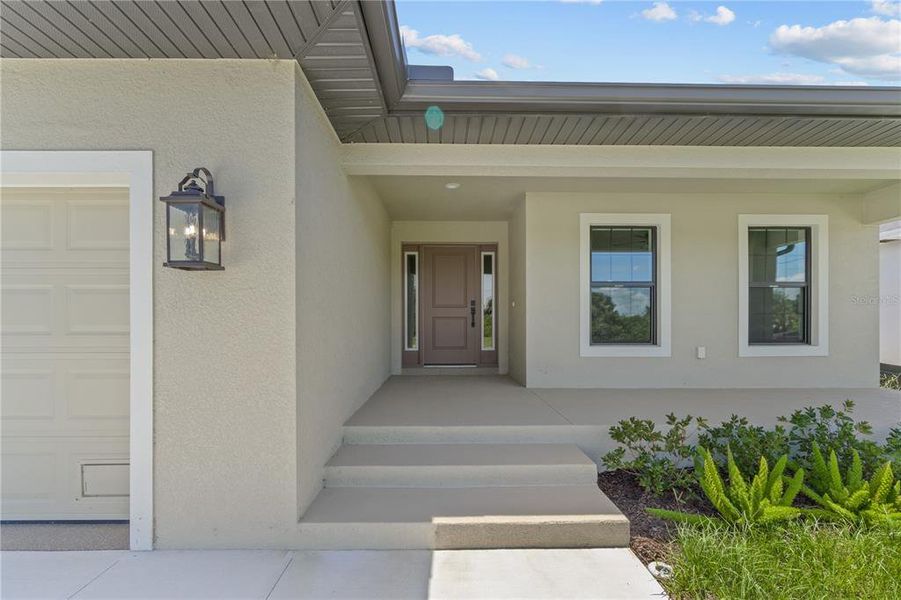 Exterior details and patio area of a home in , Rotonda West (Image 3).