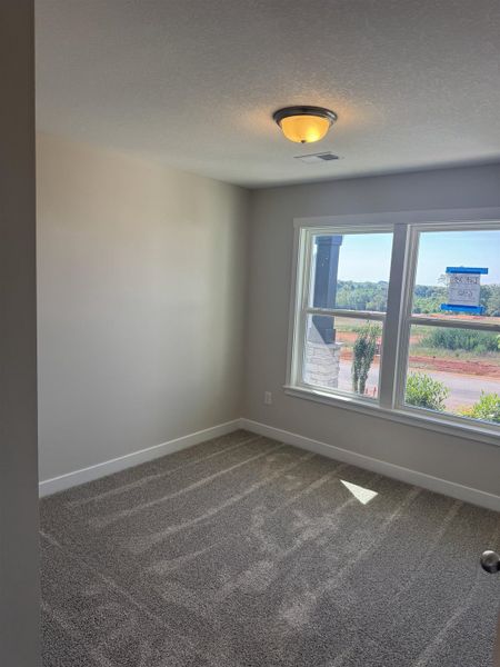 Spacious, unfurnished interior of a new home in Davis Heights, Inman (Image 12).
