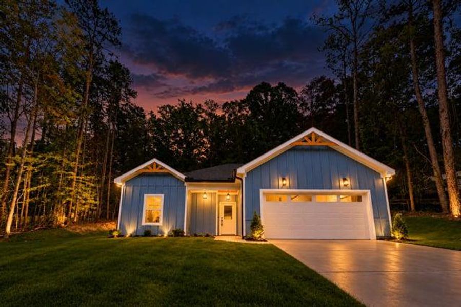Front exterior of a new home in , Gainesville, GA, highlighting curb appeal (Image 26). Front exterior of a new home in , Gainesville, GA, highlighting curb appeal (Image 26).