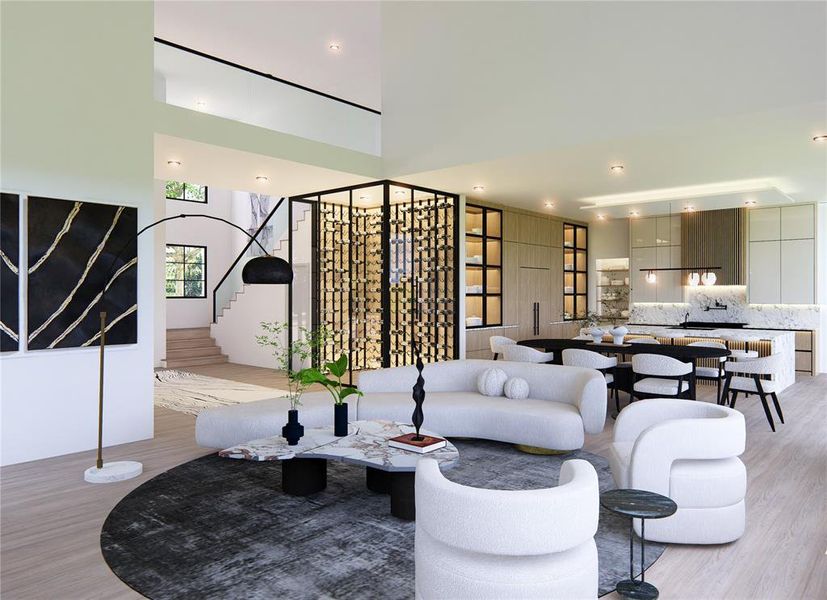 Living room featuring light wood-type flooring and a towering ceiling