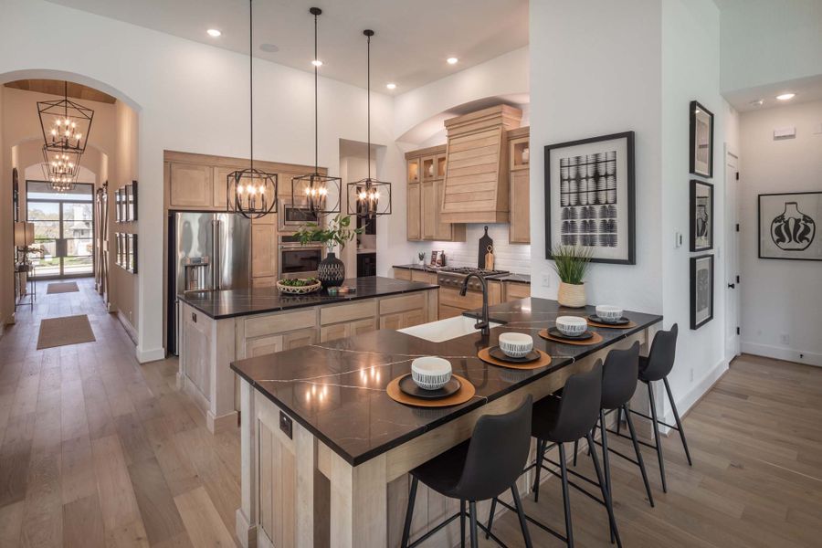 Representative furnished interior of a home built from the 216G by Highland Homes in Quail Hollow, Rockwall (Image 15). Representative furnished interior of a home built from the 216G by Highland Homes in Quail Hollow, Rockwall (Image 15).