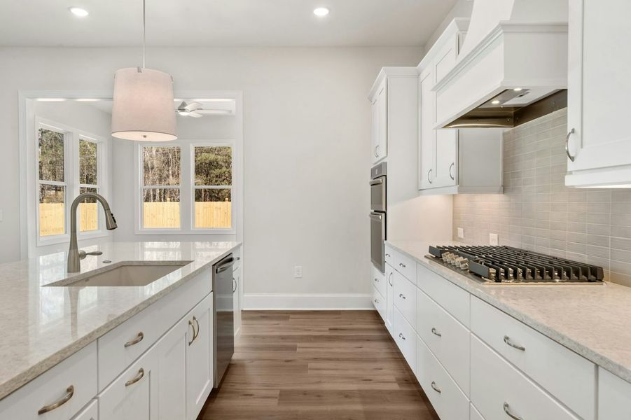 Representative furnished interior of a home built from the The Primrose by Windsong Properties in Ashbury Commons, Powder Springs (Image 9). Representative furnished interior of a home built from the The Primrose by Windsong Properties in Ashbury Commons, Powder Springs (Image 9).