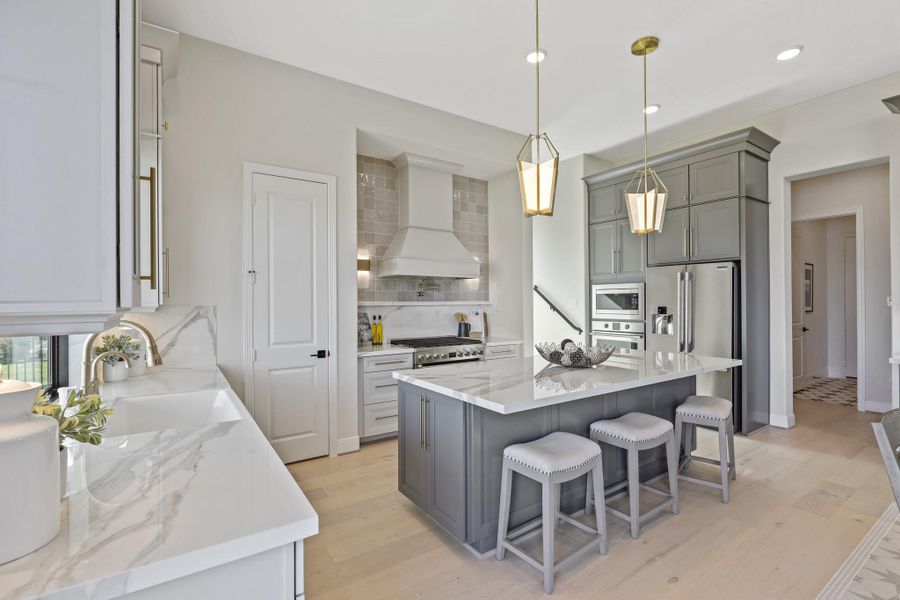 Gourmet kitchen with a sink which overlooks the backyard. Representational image.