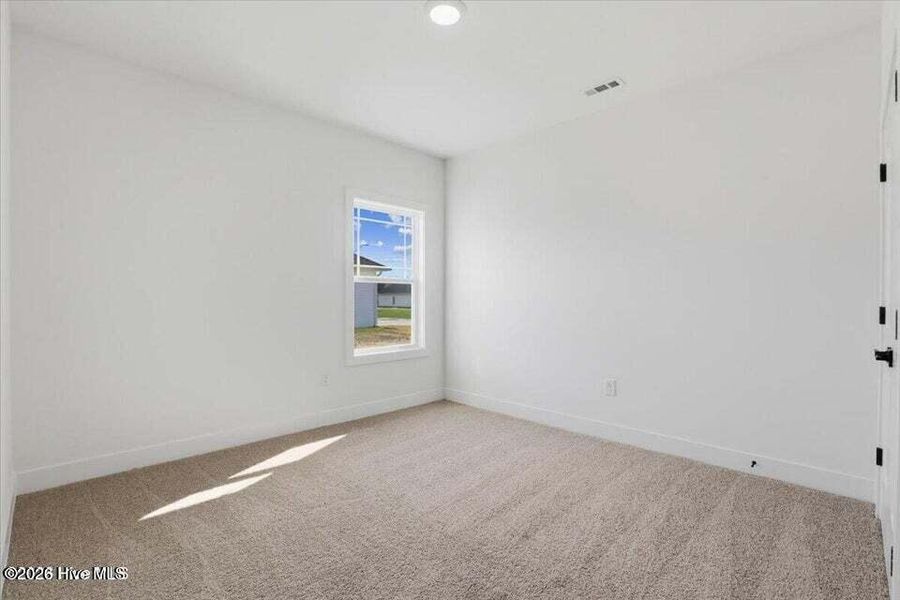 Spacious, unfurnished interior of a new home in Wood Creek Landing, Leland (Image 22). Spacious, unfurnished interior of a new home in Wood Creek Landing, Leland (Image 22).
