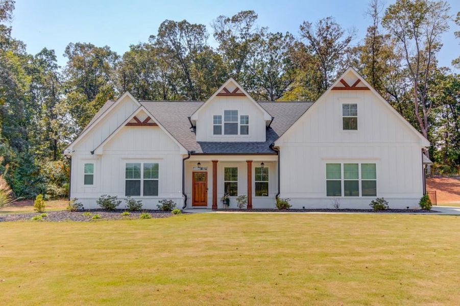 Front exterior of a new home in , Jefferson, GA, highlighting curb appeal (Image 23).