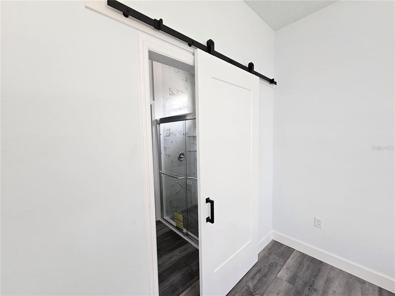 Primary Suite Bathroom with Barn Door