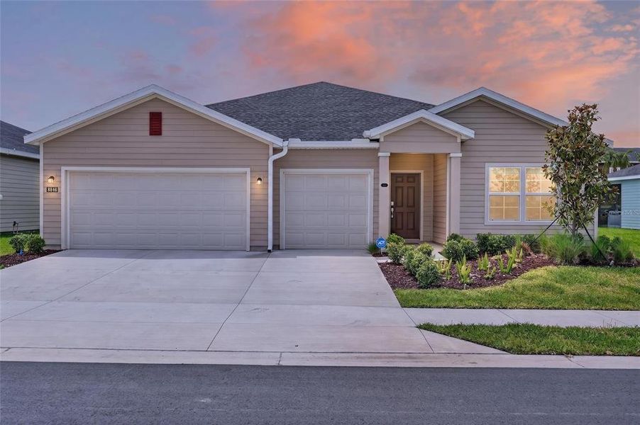 Front exterior of a new home in Pioneer Ranch, Ocala, FL, highlighting curb appeal (Image 2). Front exterior of a new home in Pioneer Ranch, Ocala, FL, highlighting curb appeal (Image 2).