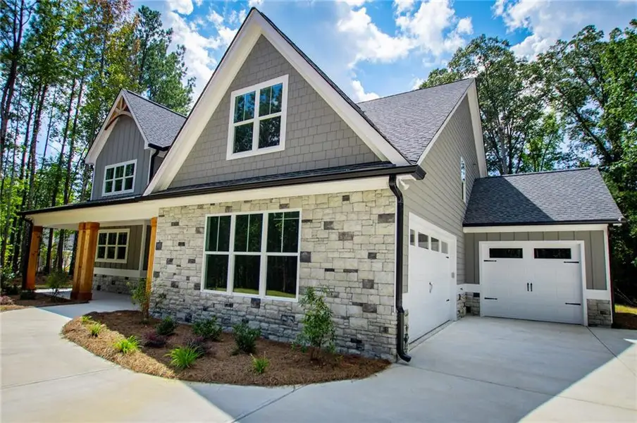 Front exterior of a new home in , Douglasville, GA, highlighting curb appeal (Image 28).