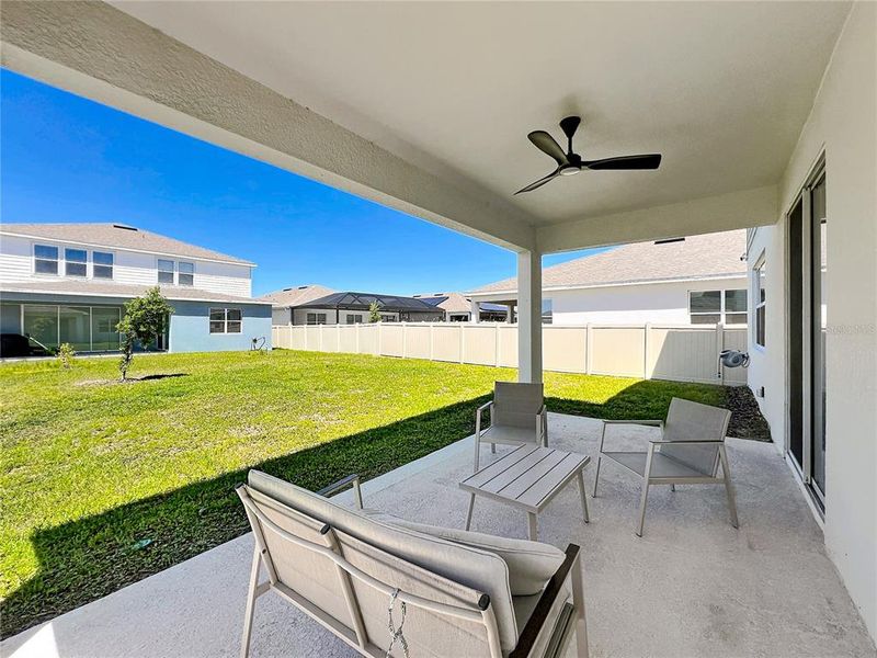 Exterior details and patio area of a home in Amelia Groves, St. Cloud (Image 3).