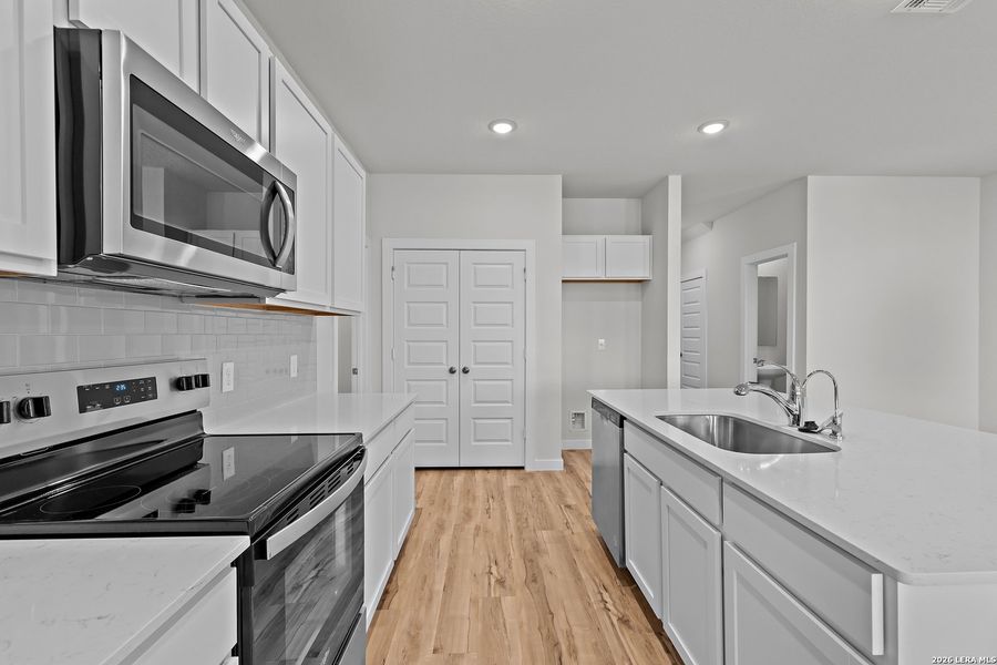 Furnished interior view inside a new home in Mesa Vista, San Antonio (Image 7).