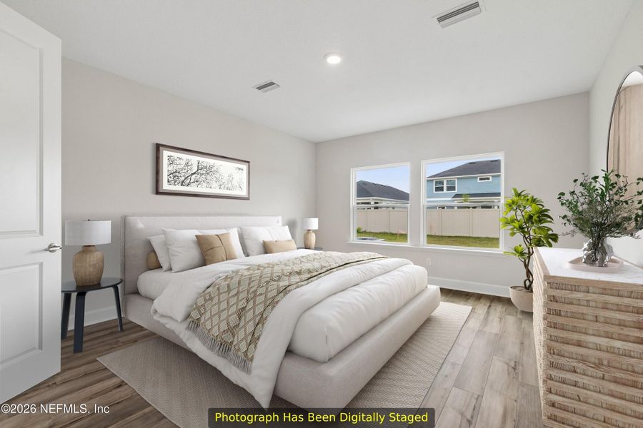 Furnished interior view inside a new home in Tributary 50', Yulee (Image 6).