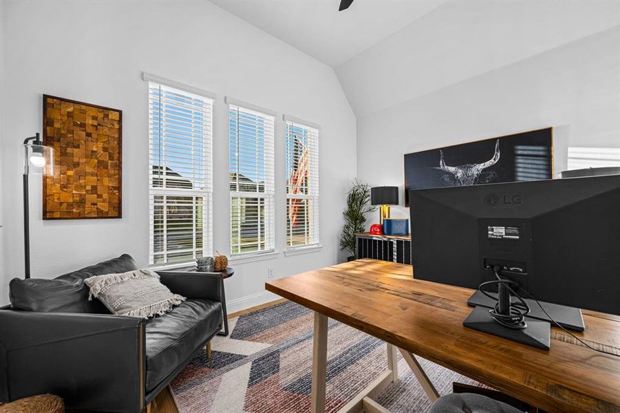 Office area featuring great natural light and a vaulted ceiling. Office area featuring great natural light and a vaulted ceiling.