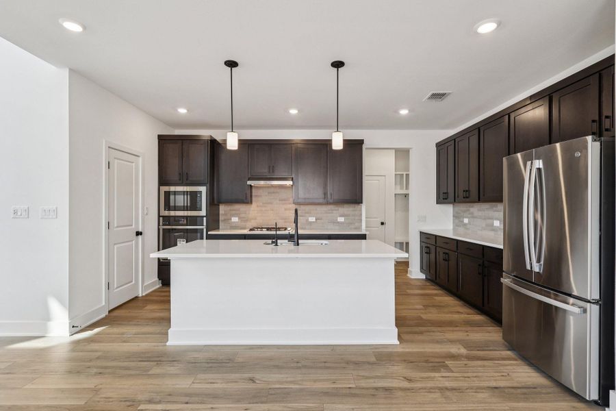 Furnished interior view inside a new home in Lariat, Liberty Hill (Image 7). Furnished interior view inside a new home in Lariat, Liberty Hill (Image 7).