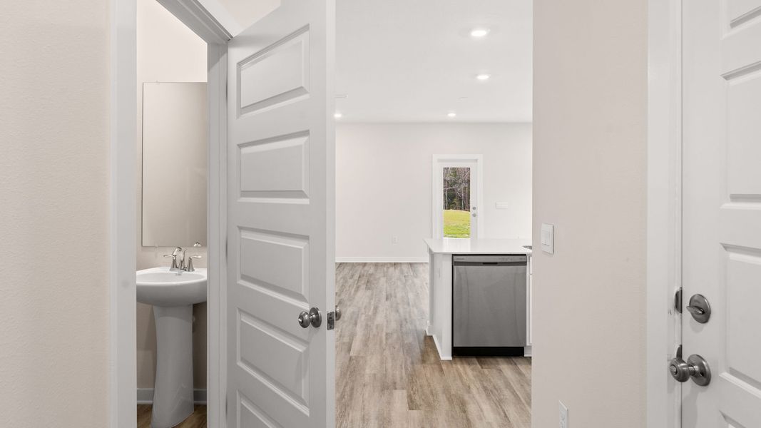 Furnished interior view inside a new home in Genoa Landing Townhomes, Freeport (Image 10).