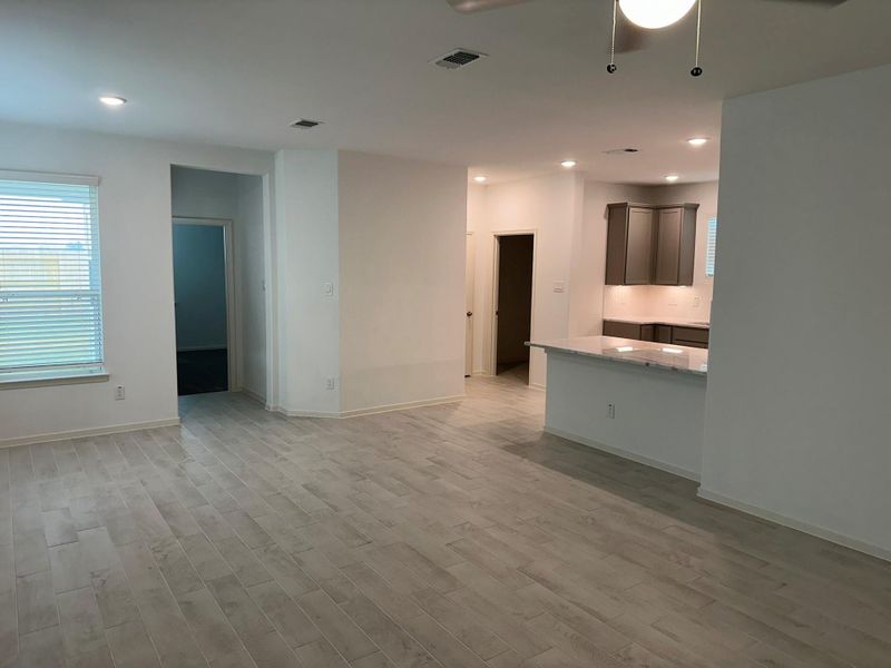 Spacious, unfurnished interior of a new home in Creekhaven, Iowa Colony (Image 13).