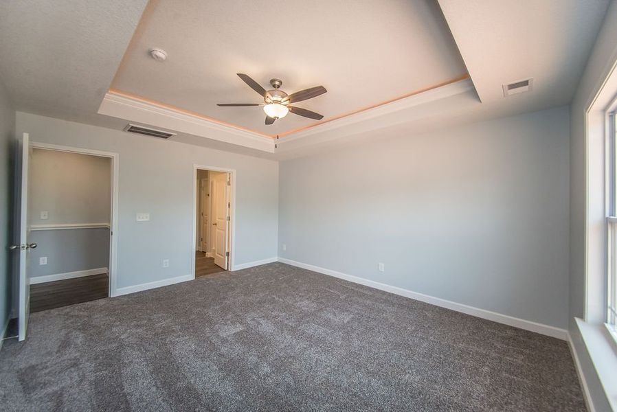 Representative unfurnished interior of a home built from the Franklin by Enchanted Homes in Guadalupe Heights, Seguin (Image 38).