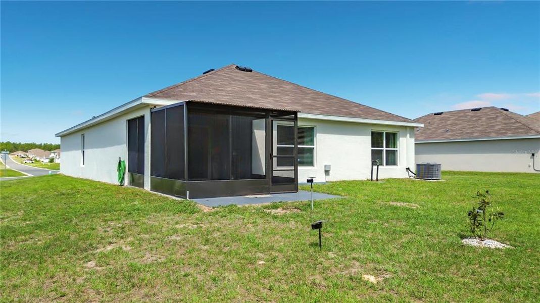 Exterior details and patio area of a home in Huntington Ridge, Ocala (Image 22).