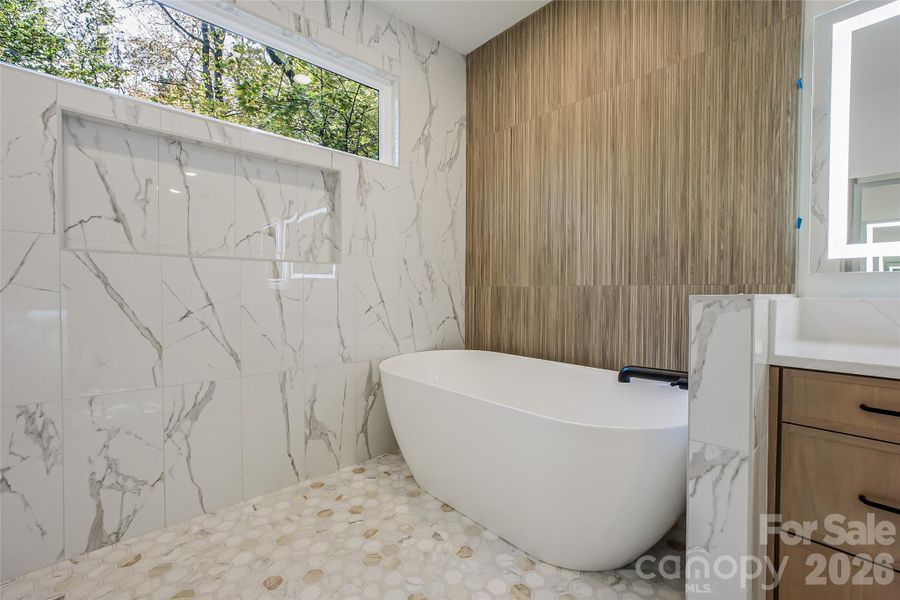 Representative photo of a completed home with the same floorplan. Photos do not reflect the exact finishes.