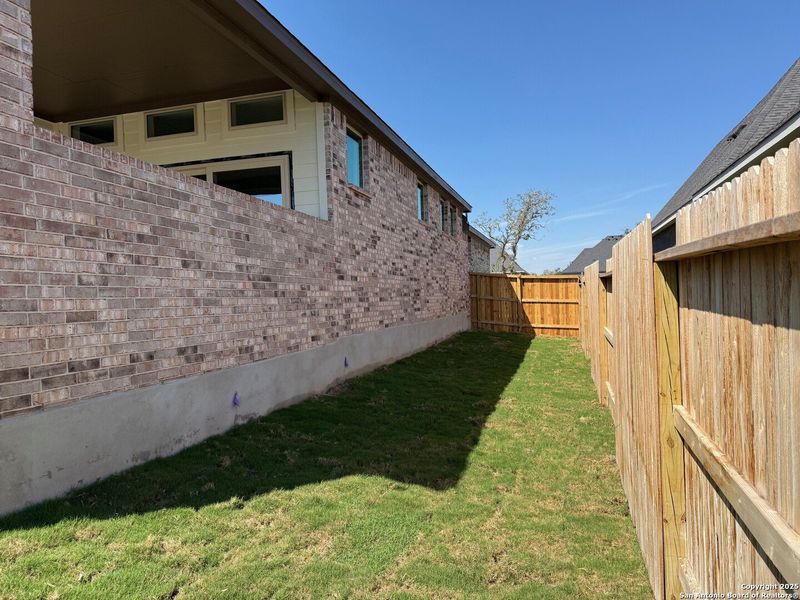 Exterior details and patio area of a home in Mesa Western, Cibolo (Image 24).