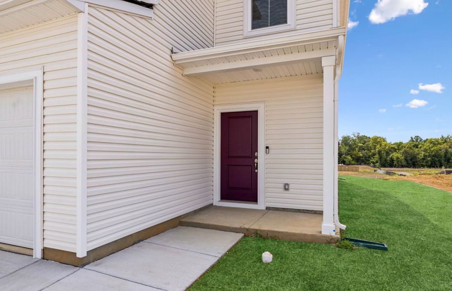 Exterior details and patio area of a home in Highlands of Carter's Station, Columbia (Image 25).